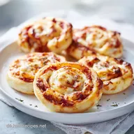 Fingerfood Pizzaschnecken f&uuml;r 12 G&auml;ste
